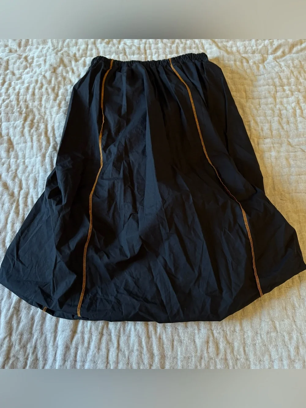 BASERANGE The Turn Skirt In Black Organic Cotton Contrast Stitch Twisted Seams